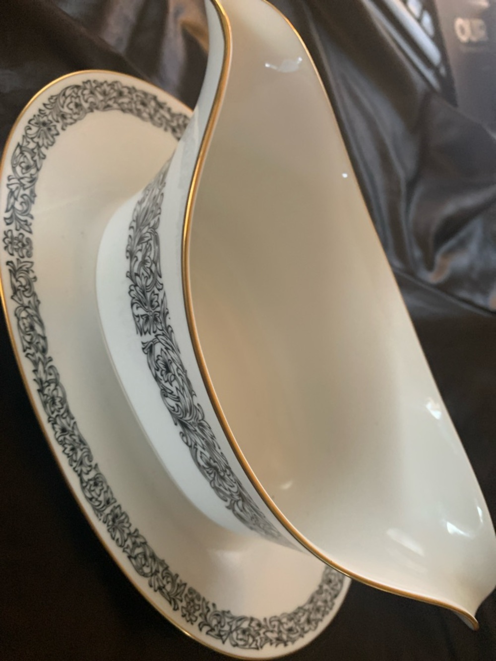 Elegant White Porcelain Gravy Boat with Black Scroll Pattern and Gold Trim